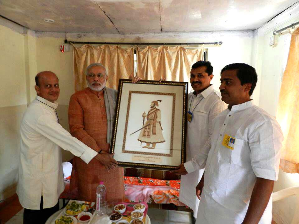 Shri Narendra Modi receiving Chhatrapati Shivaji Maharaj's portrait